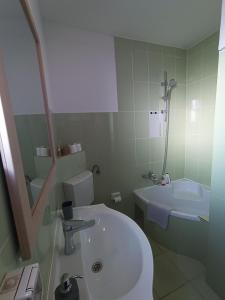 Baðherbergi á Apartman Lumi - Stari Grad