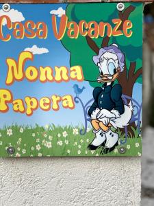 a sign for aaa waimea ni ni ni ni ni awa ni ni at Casa Vacanze Nonna Papera near Cinque Terre in Bolano