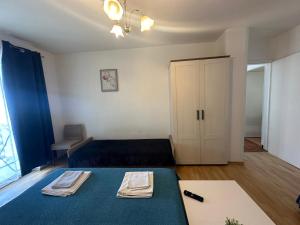 Postel nebo postele na pokoji v ubytování Apartmani Ira