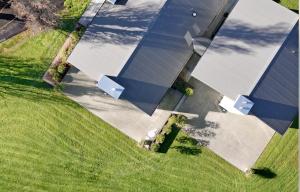 an overhead view of a house with a solar roof at Kaitahi Lodge in Palmerston North