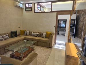 Posezení v ubytování Agréable maisonnette au centre de Rabat