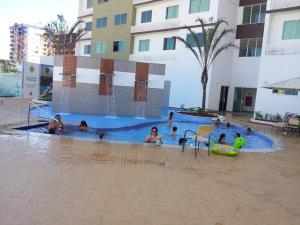 a group of people in a swimming pool at Riviera Park in Caldas Novas