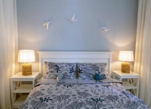Katil atau katil-katil dalam bilik di Apartament Wyspa Mew - 150 m od plaży
