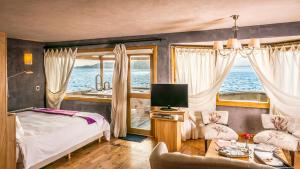 Postel nebo postele na pokoji v ubytování Lirolay Suites - Apart Hotel