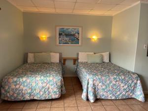 Postel nebo postele na pokoji v ubytování Barcelona Motel