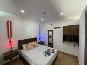 Postel nebo postele na pokoji v ubytování villa beach and art