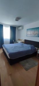 En eller flere senge i et værelse på GARDEN RESORT ELA Umag