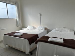 Rúm í herbergi á BeB Hotel - Apt Particular