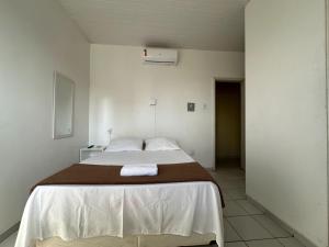 Rúm í herbergi á BeB Hotel - Apt Particular