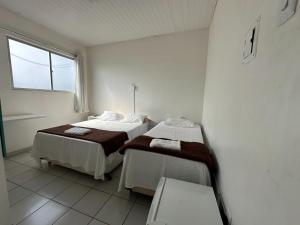 Rúm í herbergi á BeB Hotel - Apt Particular