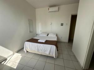 Rúm í herbergi á BeB Hotel - Apt Particular