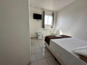 Rúm í herbergi á BeB Hotel - Apt Particular