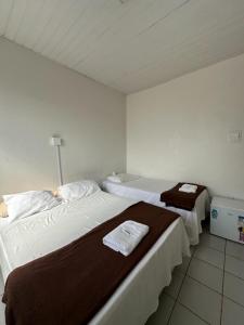 Rúm í herbergi á BeB Hotel - Apt Particular