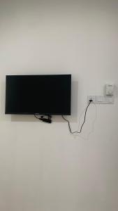 TV a/nebo společenská místnost v ubytování Bilik Ubaidillah