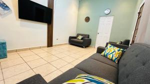 Et tv og/eller underholdning på Muy cerca de playas y miradores muy accesible a la ciudad y comercios