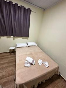 Katil atau katil-katil dalam bilik di Chalezim VIP 4 - Casa com Piscina +15 gambar