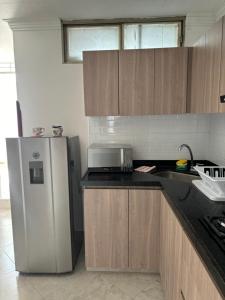 Kuchyň nebo kuchyňský kout v ubytování ApartahotelVacacionalSangil