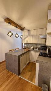 Kuchyň nebo kuchyňský kout v ubytování Luxury cozy apartment with mountain view andhot tub in Pisac + 26 fotografií