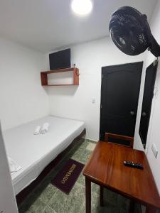 Postel nebo postele na pokoji v ubytování Hotel Melemar