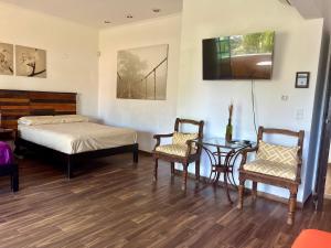 Postel nebo postele na pokoji v ubytování Cancun-Soho