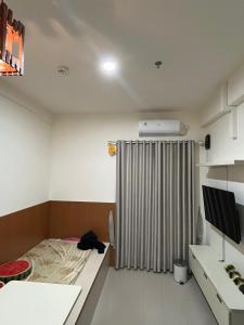Postel nebo postele na pokoji v ubytování Comfort and Cozy Apartment Nagoya Citra Plaza ,One Bedroom Type