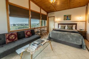 Кровать или кровати в номере Mountainview Villa Luxury Lodge +99 фотографий