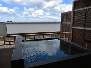 a swimming pool on the balcony of a house at Taketoritei Maruyama in Arima Onsen in Kobe +162 photos