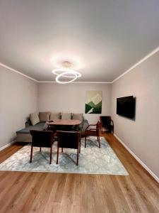 Un televizor și/sau centru de divertisment la Apartments Asia Palace