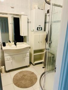 Kúpeľňa v ubytovaní Rézi Apartman