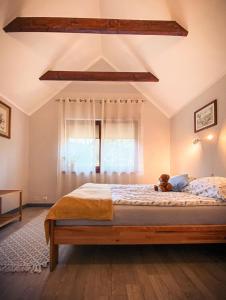 Posteľ alebo postele v izbe v ubytovaní Apartament Leśna