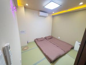 Voodi või voodid majutusasutuse 二室一厅-大阪中心-心斋桥-难波-梅田-USJ-日本桥-大阪城公园-京都神户奈良-地铁站200m toas