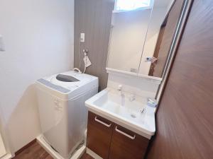 Vannituba majutusasutuses 二室一厅-大阪中心-心斋桥-难波-梅田-USJ-日本桥-大阪城公园-京都神户奈良-地铁站200m +17 fotot