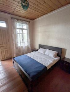 Voodi või voodid majutusasutuse Tasia Guesthouse toas