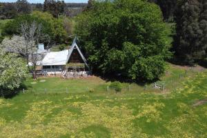 an aerial view of a farm with a barn at Cherswood Farm in Balbarrup