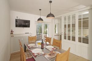 TV a/nebo společenská místnost v ubytování iFlat Col Grostè super panoramic view Campiglio