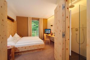 Posteľ alebo postele v izbe v ubytovaní Hotel Madatsch