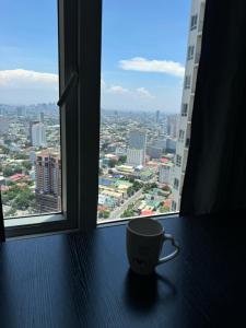 Nespecifikovaný výhled na destinaci Manila nebo výhled na město při pohledu z aparthotelu