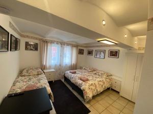 Postel nebo postele na pokoji v ubytování Hotel Adriana