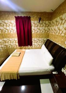 Postel nebo postele na pokoji v ubytování ARK HOTEL SUBANG