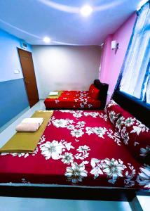 Postel nebo postele na pokoji v ubytování ARK HOTEL SUBANG