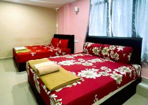 Postel nebo postele na pokoji v ubytování ARK HOTEL SUBANG