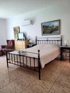 Postel nebo postele na pokoji v ubytování Μοναδικό δωμάτιο