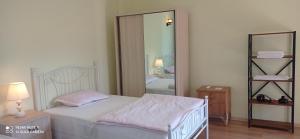 Letto o letti in una camera di GUEST HOUSE RIMAS HOME