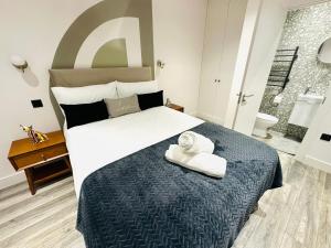 Кровать или кровати в номере Luxury Central London flats, perfect and ideal for tourists +61 фотография