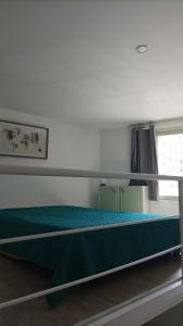 Postel nebo postele na pokoji v ubytování Grand studio duplex