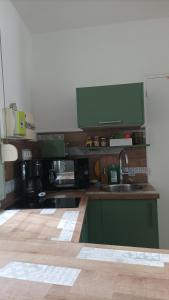 Kuchyň nebo kuchyňský kout v ubytování Grand studio duplex