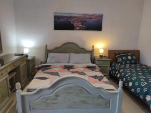 Кровать или кровати в номере Ta' Marija Home