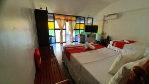 Кровать или кровати в номере Evangeline Resort +183 фотографии