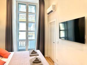 TV/trung tâm giải trí tại SAVOY Luxury Apartment CITY CENTER +18 ảnh