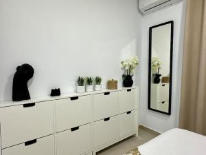 Voodi või voodid majutusasutuse New renovated appartment with beautiful view on cliffs and sea toas
